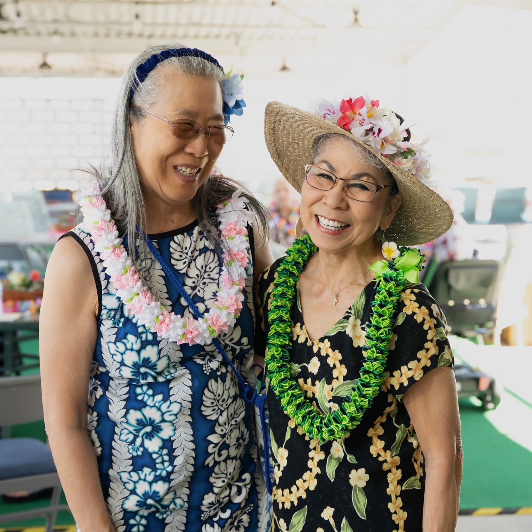 Two women smiling.